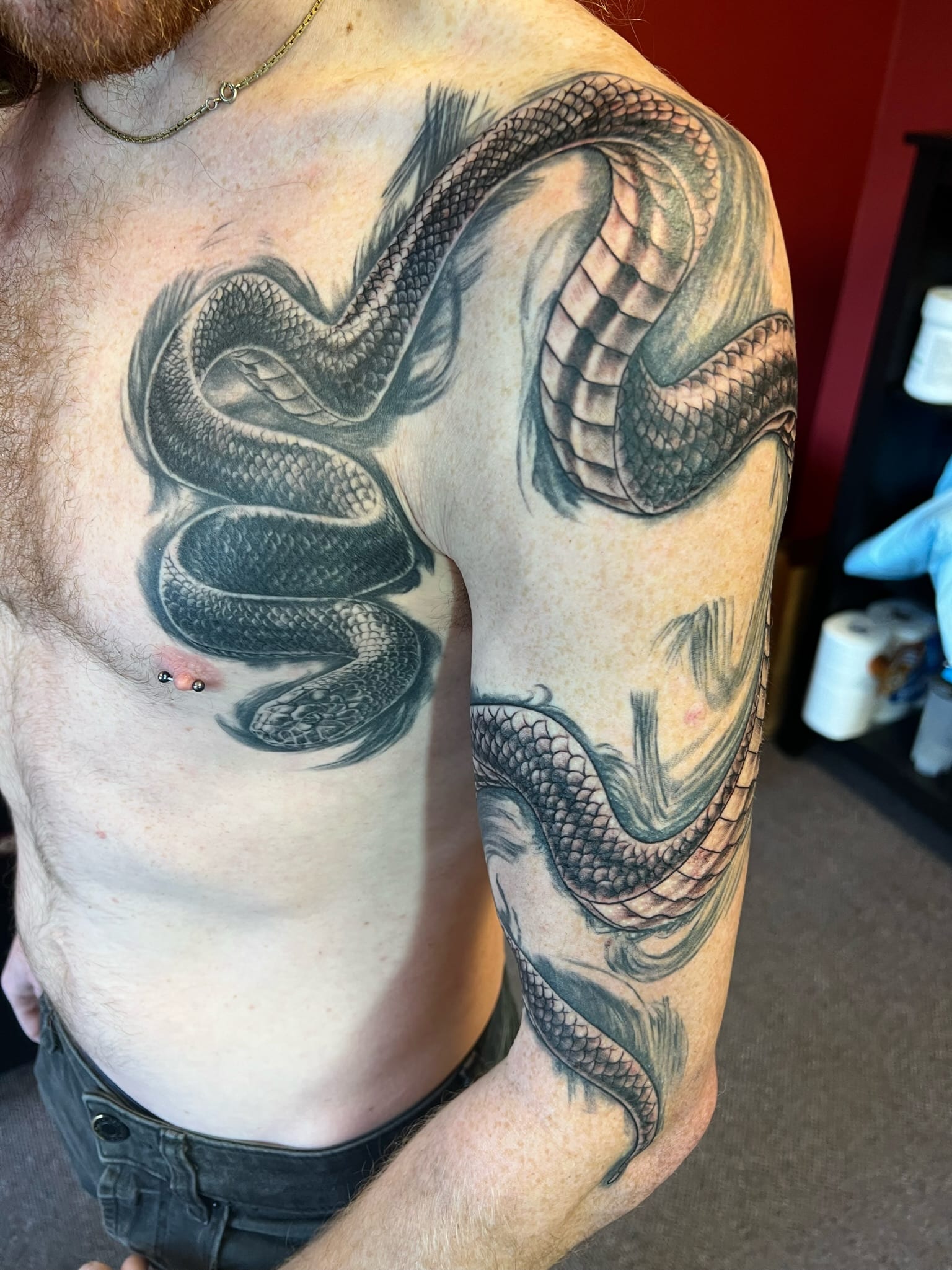 snake-sleeve-chest-tattoo-by-josh-hibbard