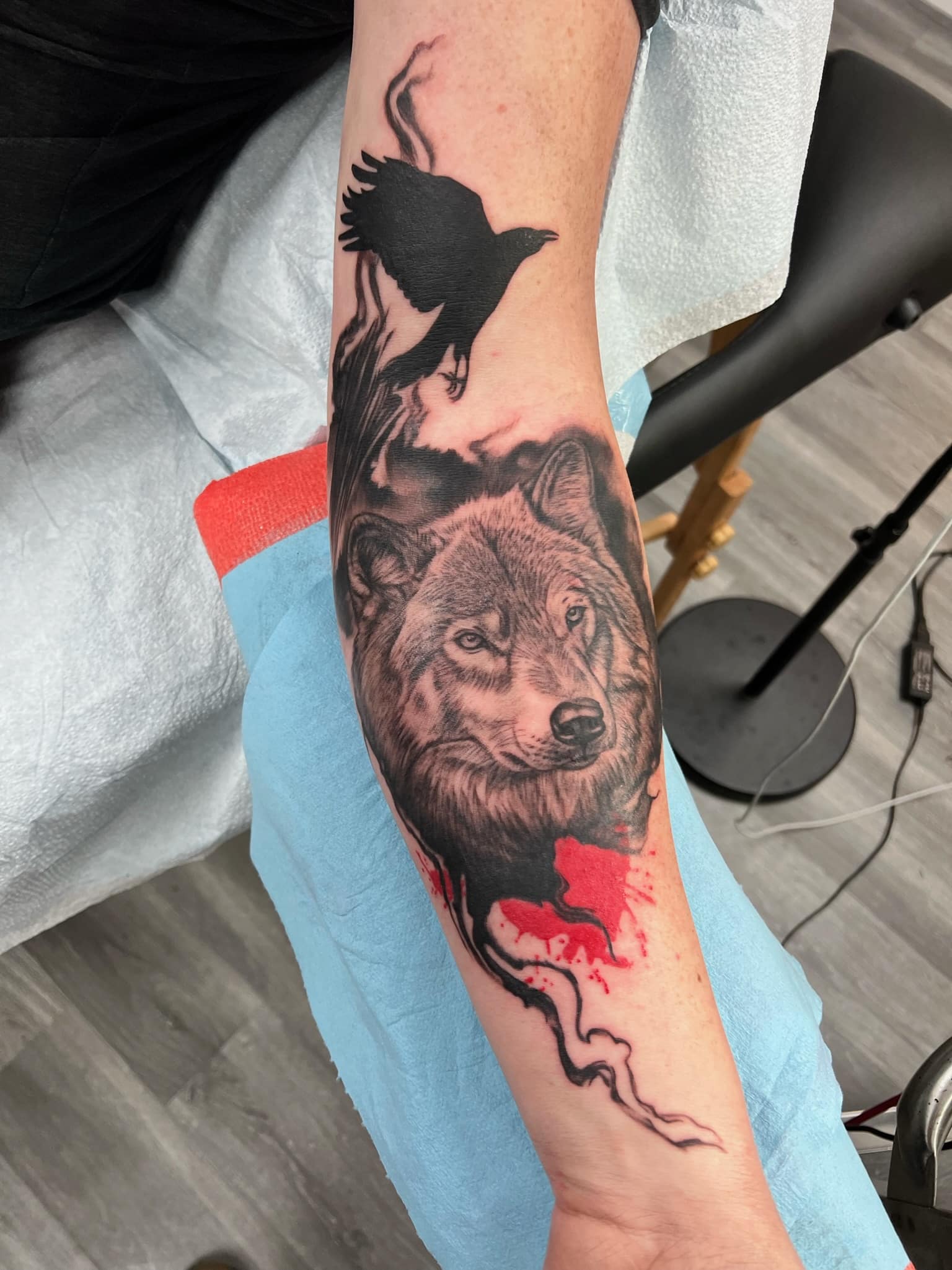 wolf-and-crow-realistic-trash-polka-tattoo-by-josh-hibbard